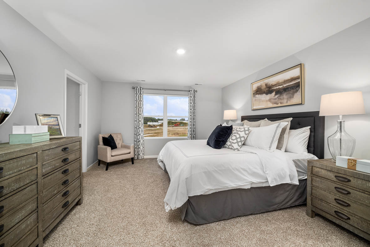 2652 Camelback Drive Pingree Grove, IL 60140 - Photo 14 of 42 a bedroom with a bed and a dresser