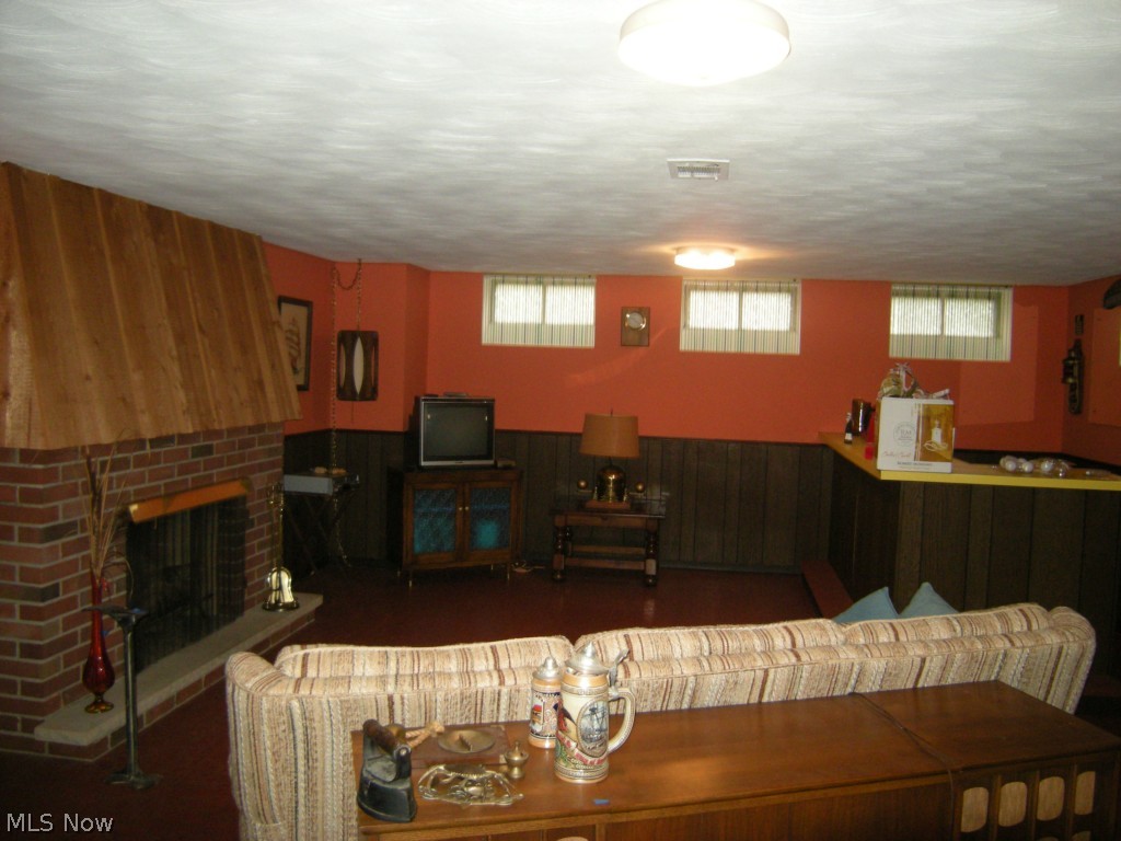 715 Ridgeview Drive Independence, OH 44131 - Photo 16 of 22 Rec room with wet bar and fireplace!