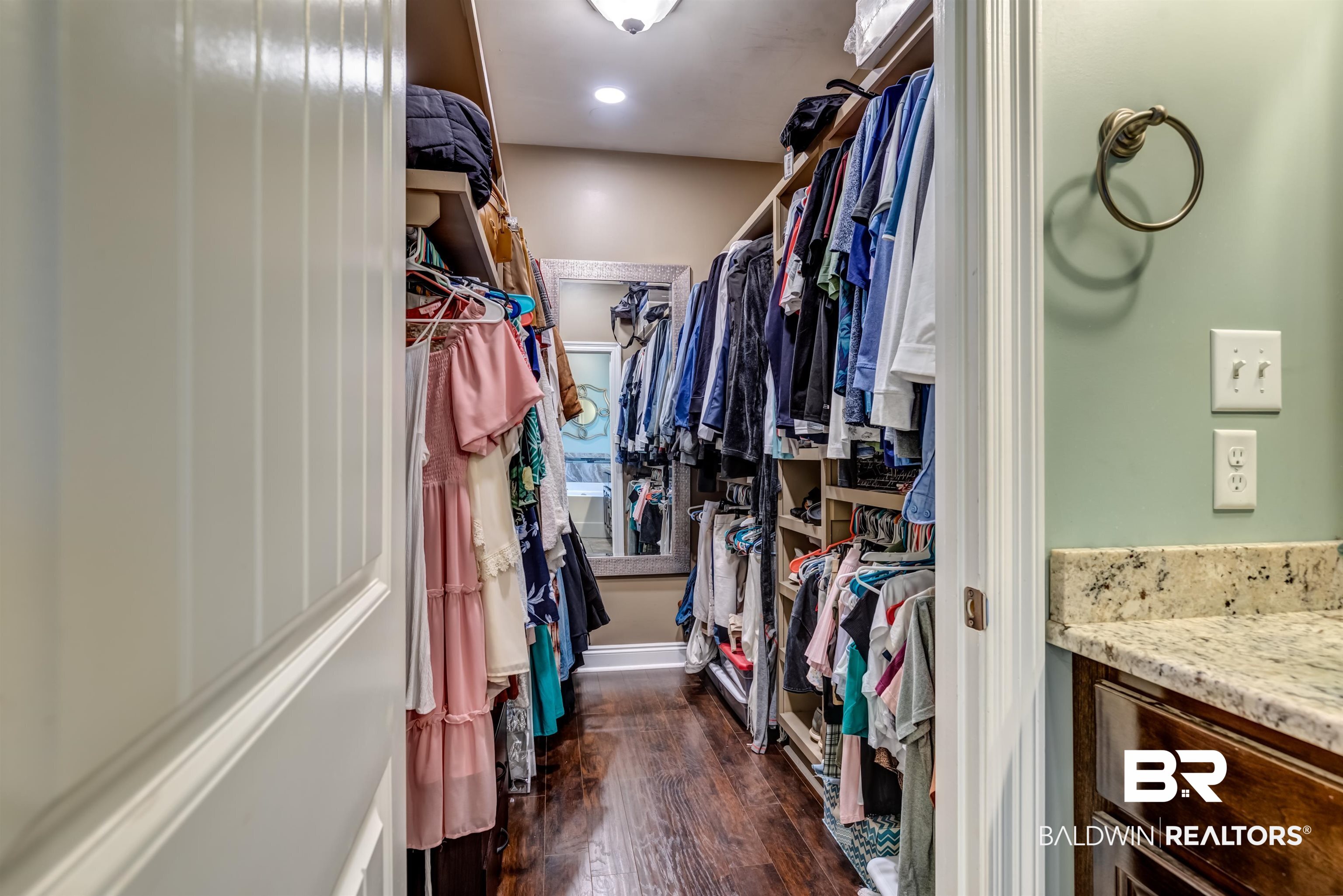 965 Henckley Avenue Mobile, AL 36609 - Photo 16 of 30 Walk in closet featuring dark wood-type flooring