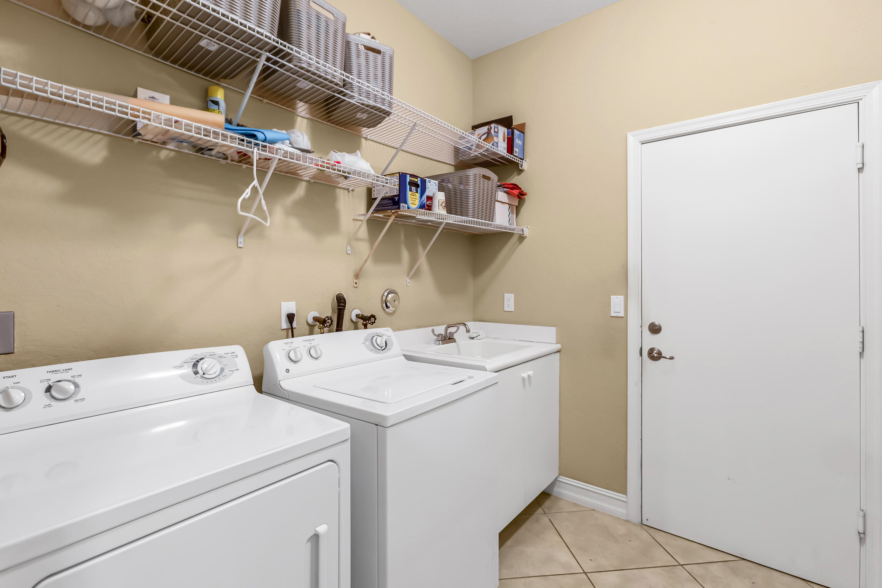 7955 Emerald Winds Circle Boynton Beach, FL 33473 - Photo 33 of 66 Laundry w/ Util Sink