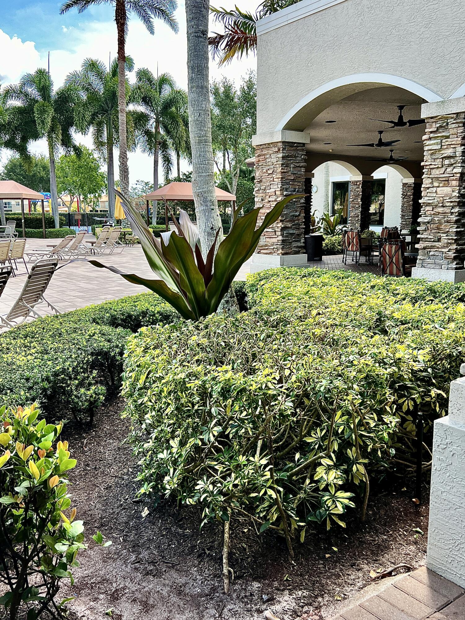 7955 Emerald Winds Circle Boynton Beach, FL 33473 - Photo 55 of 66 Canyon Springs Pool and Covered Area