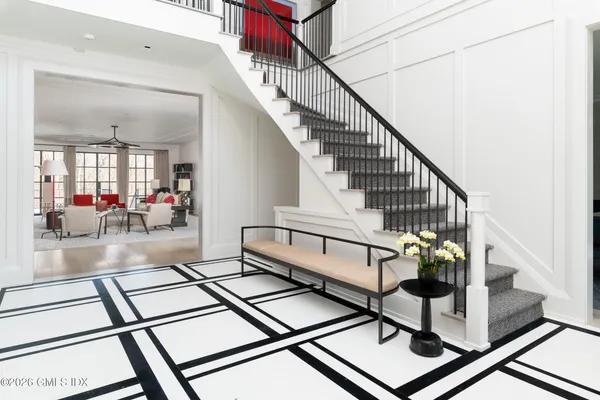 a view of entryway with wooden floor