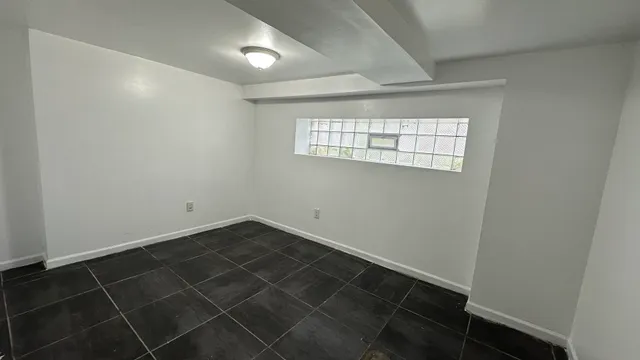 a view of a room with rack on the wall