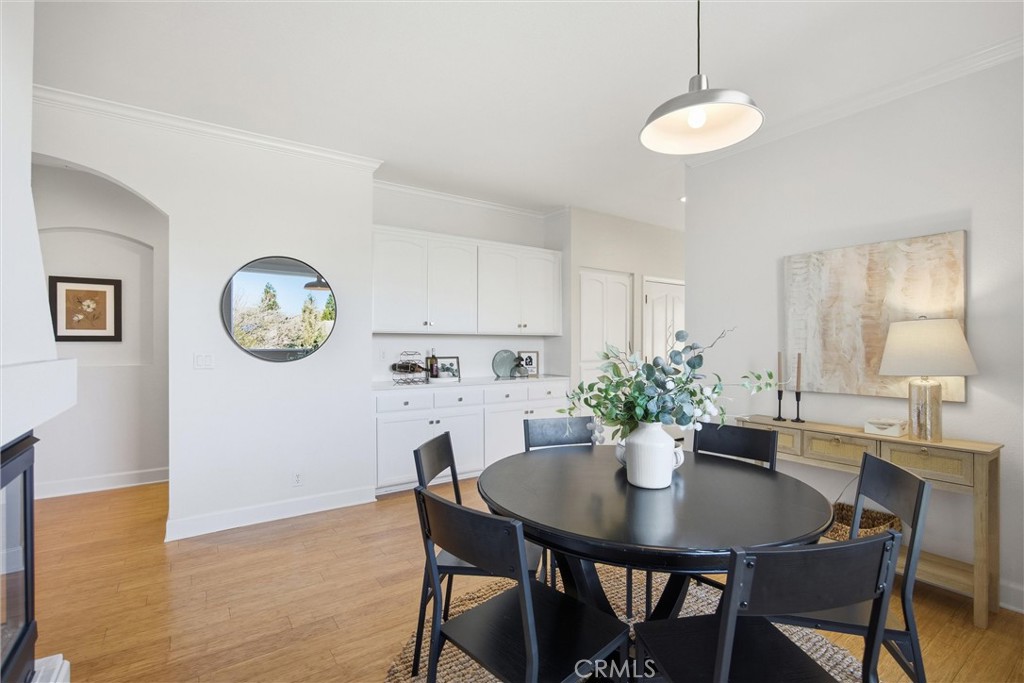 93 Benson Terrace Chico, CA 95928 - Photo 7 of 15 a view of a dining room with furniture and wooden floor