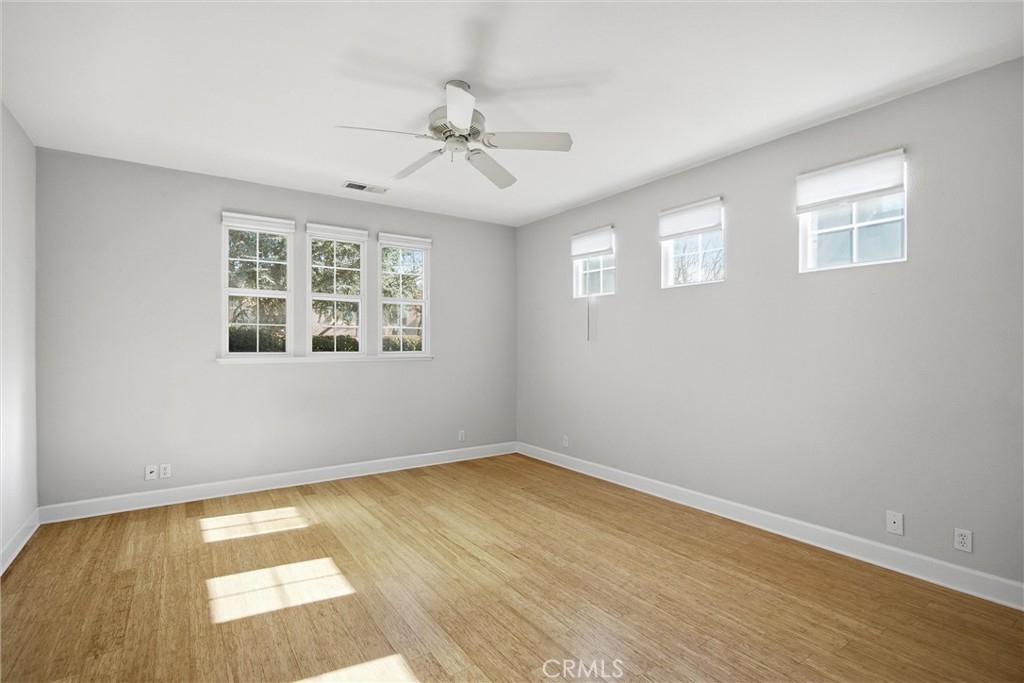 93 Benson Terrace Chico, CA 95928 - Photo 10 of 15 a view of an empty room with wooden floor and a window