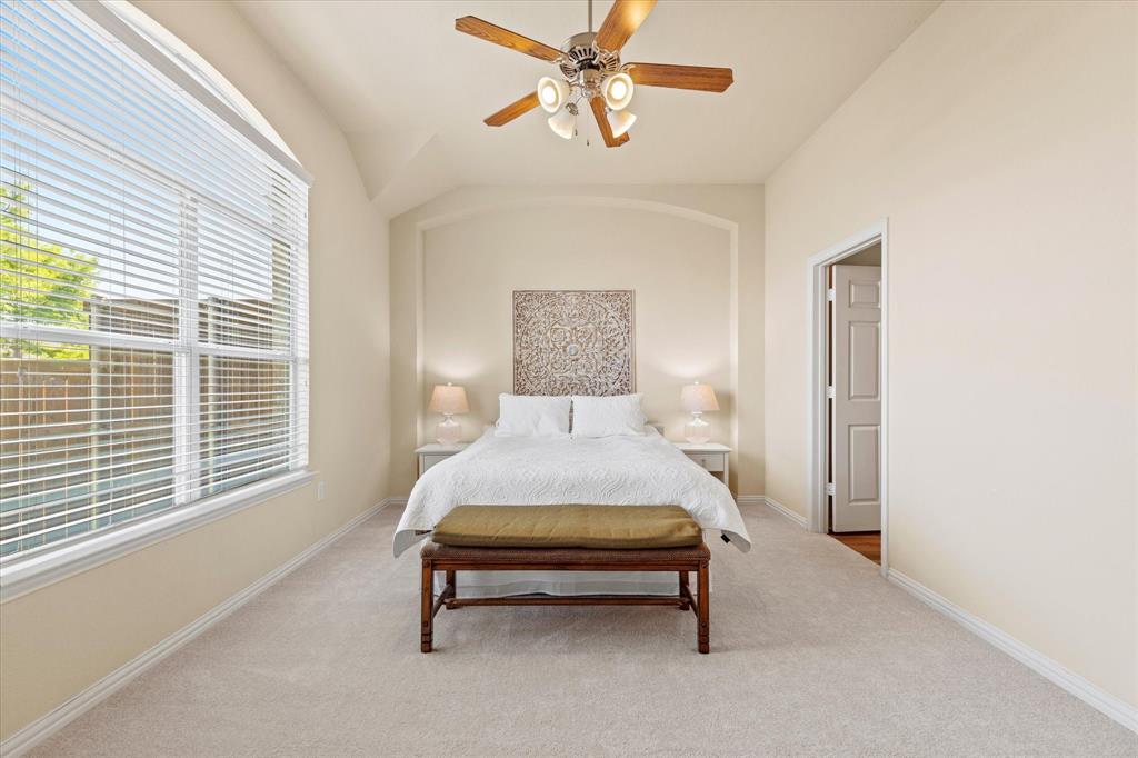 2821 Fordham Road Plano, TX 75025 - Photo 18 of 40 a bed sitting in a bedroom next to a window