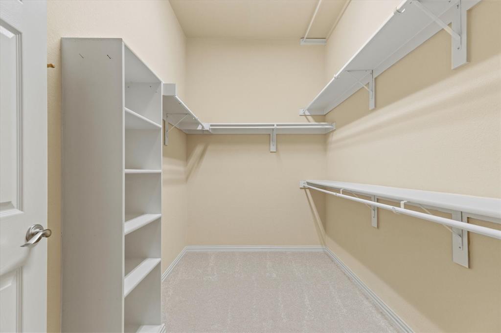 2821 Fordham Road Plano, TX 75025 - Photo 23 of 40 a view of an empty walk in closet