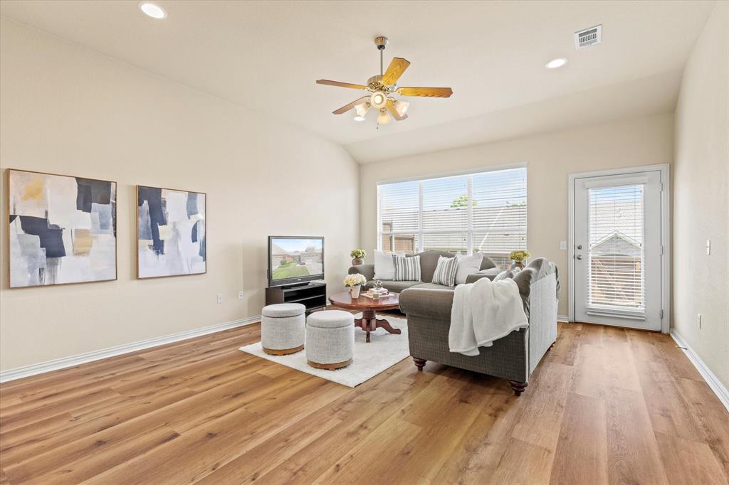2821 Fordham Road Plano, TX 75025 - Photo 5 of 40 a living room with furniture and a wooden floor