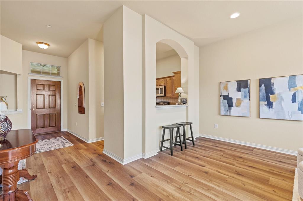 2821 Fordham Road Plano, TX 75025 - Photo 10 of 40 a view of livingroom with furniture and wooden floor