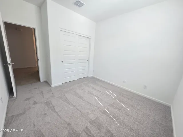 an empty room with closet