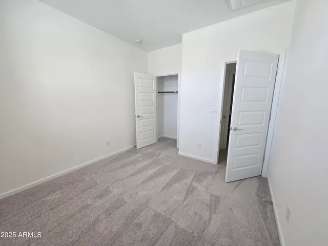 an empty room with closet