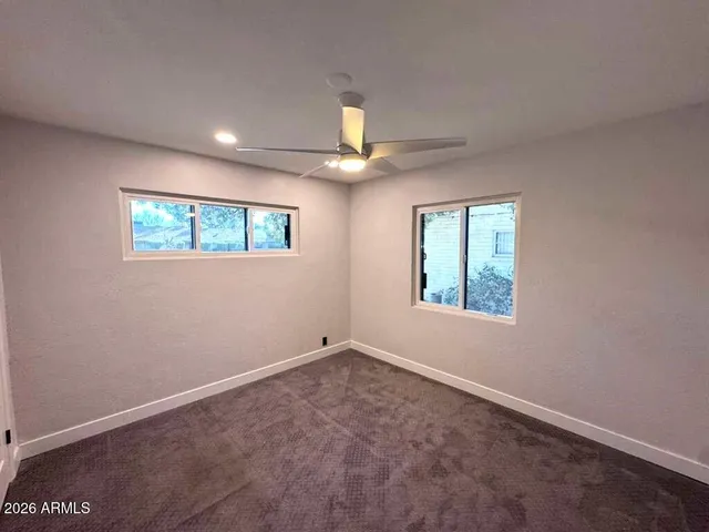 an empty room that has a window