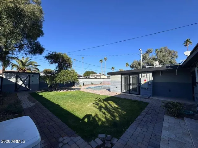 a view of a backyard with plants