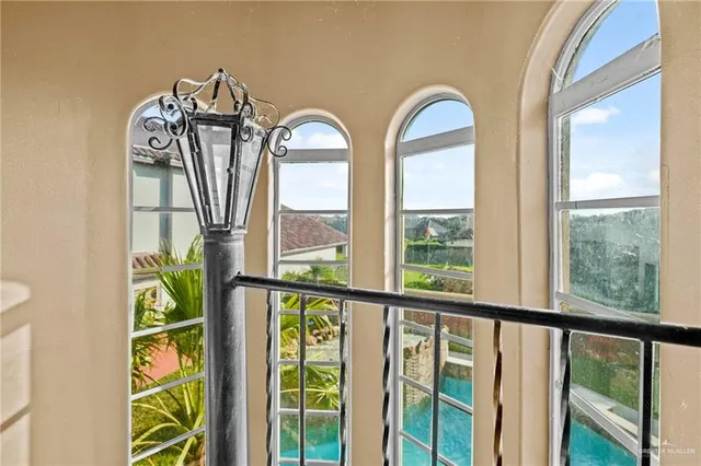 a bathroom with a sink a vanity and a window