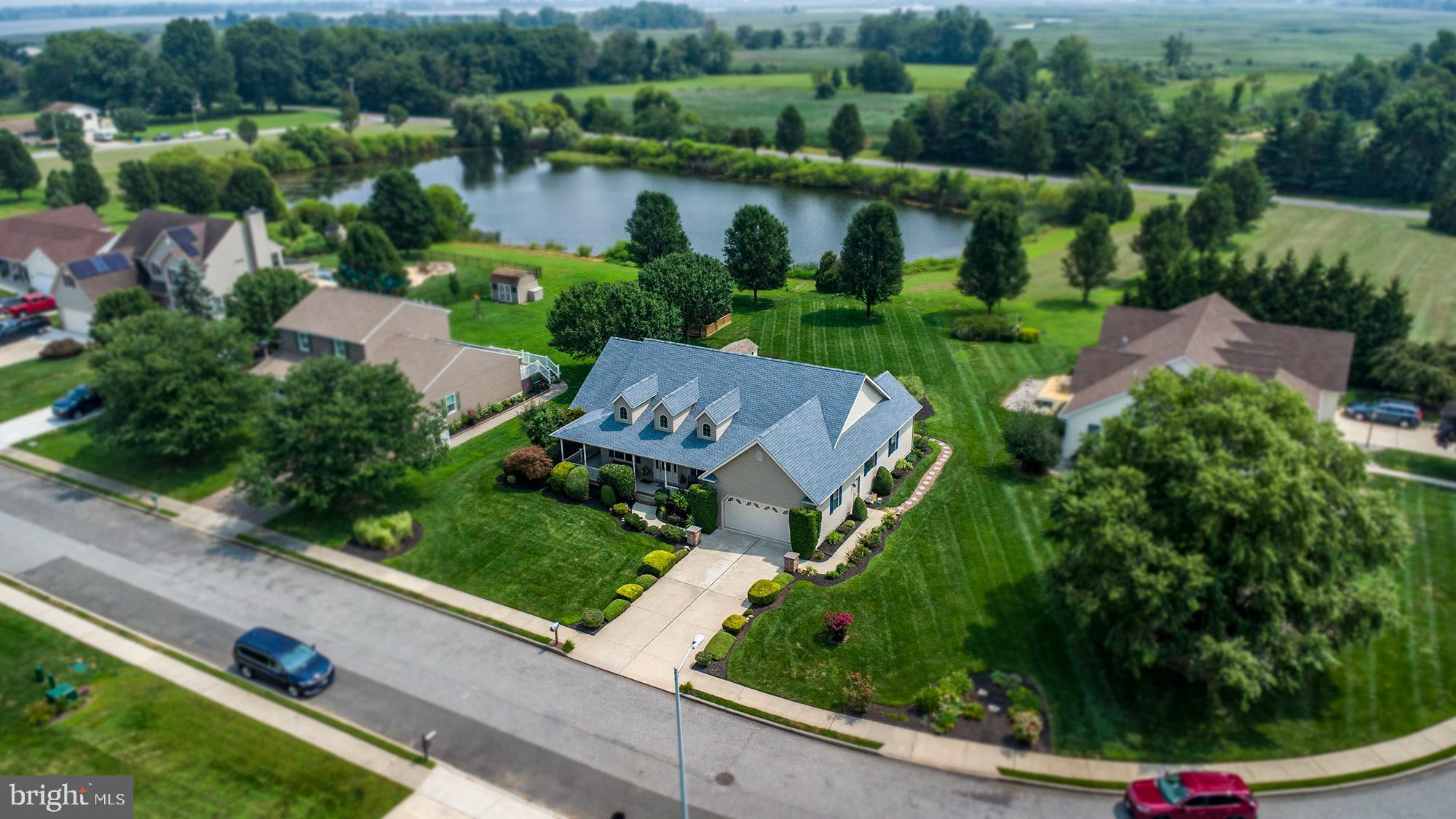 7 Meghans Way Pennsville, NJ 08070 - Photo 1 of 30 an aerial view of house with yard swimming pool and outdoor seating