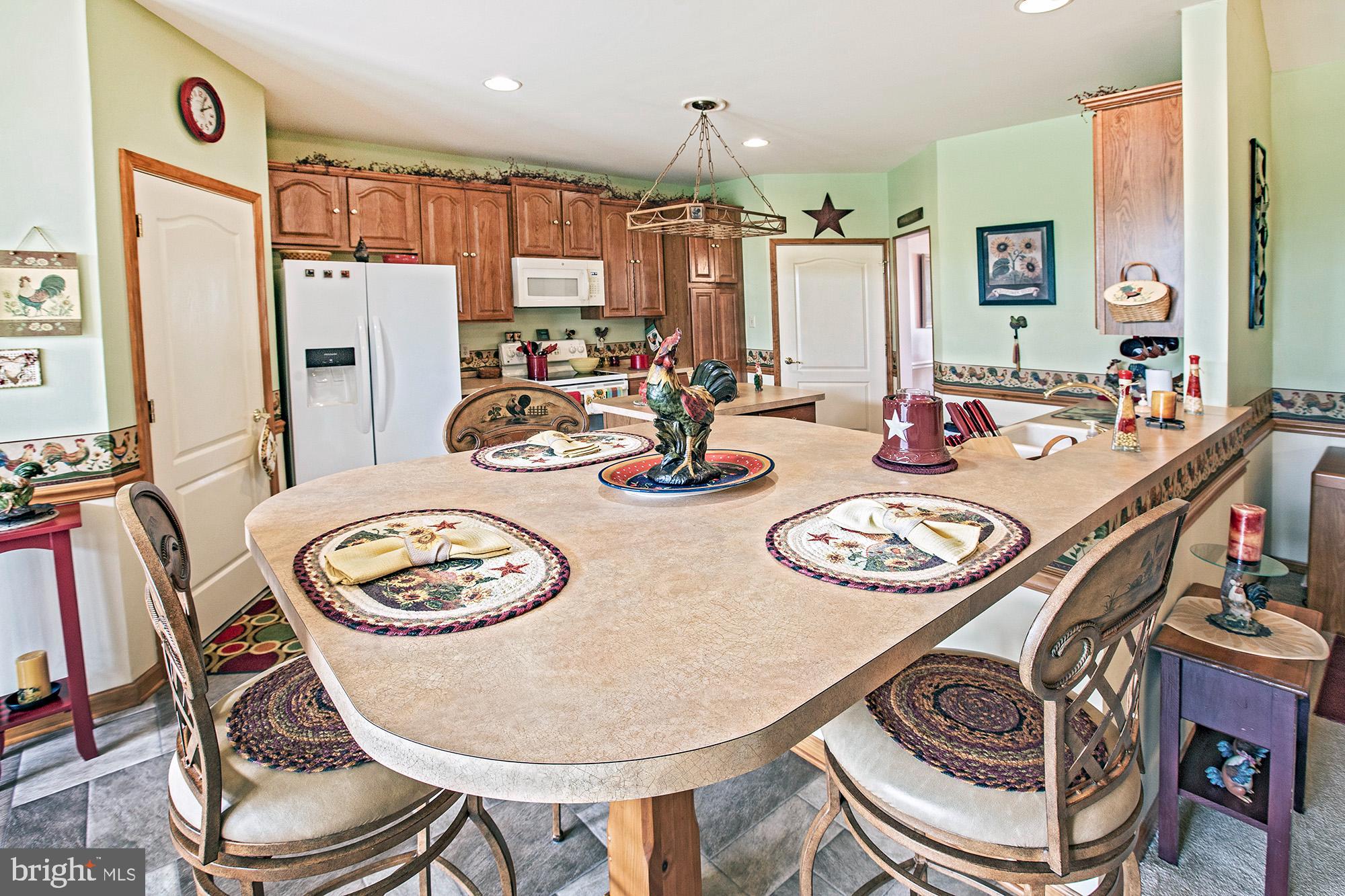 7 Meghans Way Pennsville, NJ 08070 - Photo 12 of 30 a view of a dining room with furniture