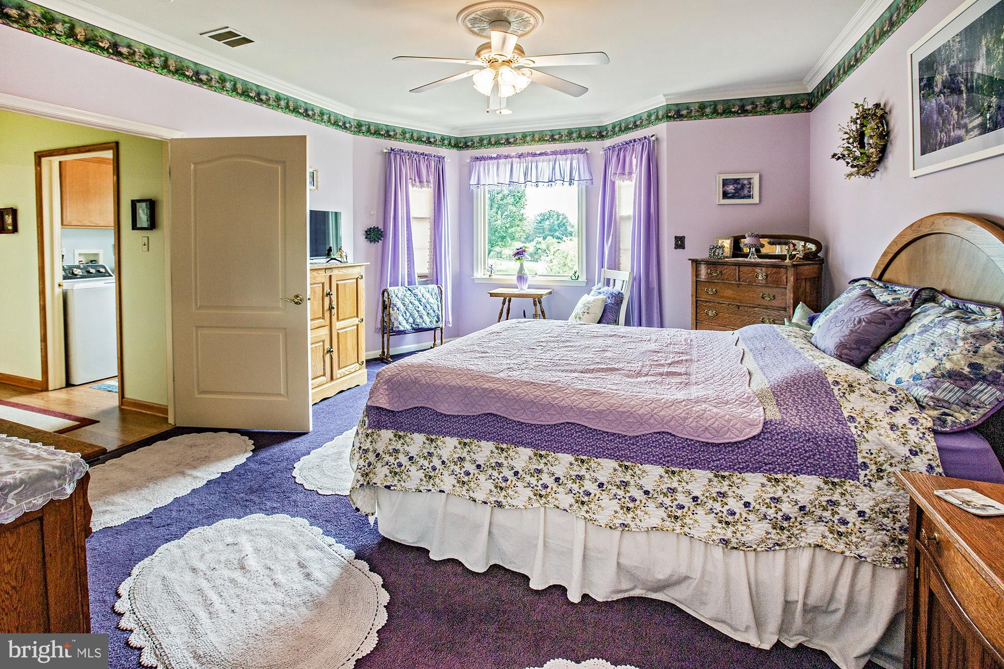 7 Meghans Way Pennsville, NJ 08070 - Photo 16 of 30 a bedroom with a bed dresser and a window