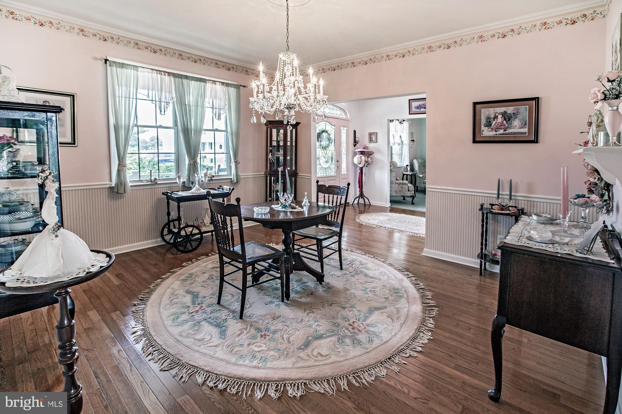 7 Meghans Way Pennsville, NJ 08070 - Photo 7 of 30 a view of a dining room with furniture window and wooden floor