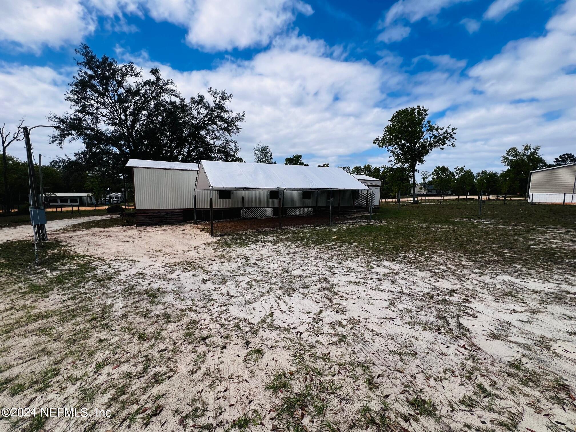 7635 Oak Forest Road Keystone Heights, FL 32656 - Photo 24 of 30 a view of a green yard