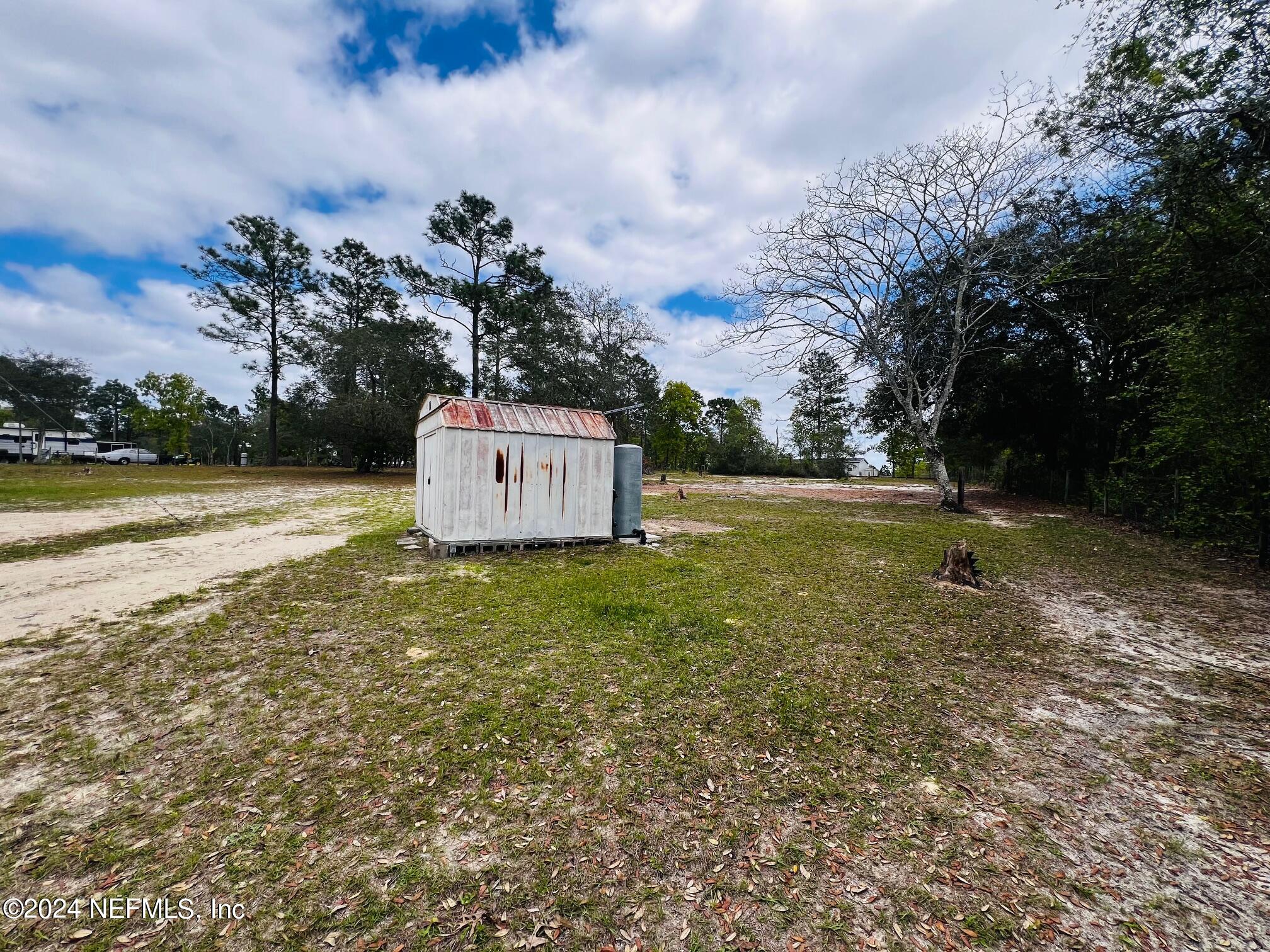 7635 Oak Forest Road Keystone Heights, FL 32656 - Photo 27 of 30 a fire hydrant in the middle of a field