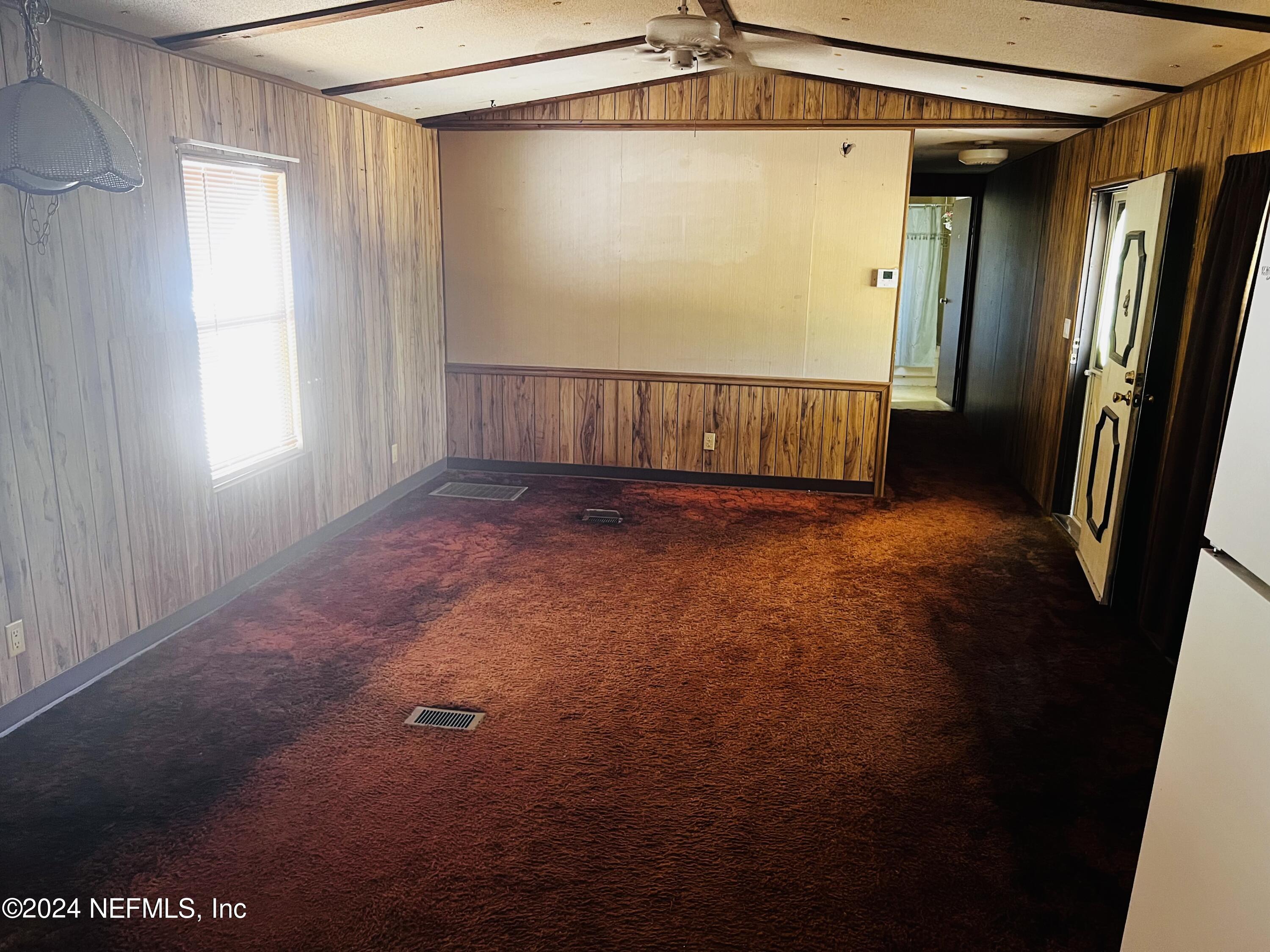 7635 Oak Forest Road Keystone Heights, FL 32656 - Photo 7 of 30 a view of a big room with a sliding door