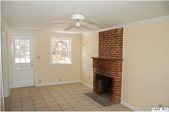 8639 Venable Road Kents Store, VA 23084 - Photo 8 of 18 a black and white photo of a livingroom with window