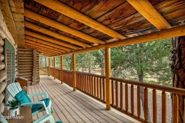 a view of porch with wooden floor in outdoor space