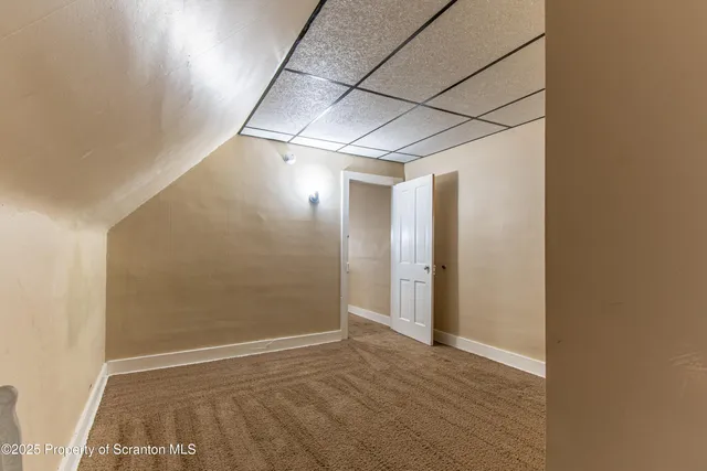 a view of hallway with closet