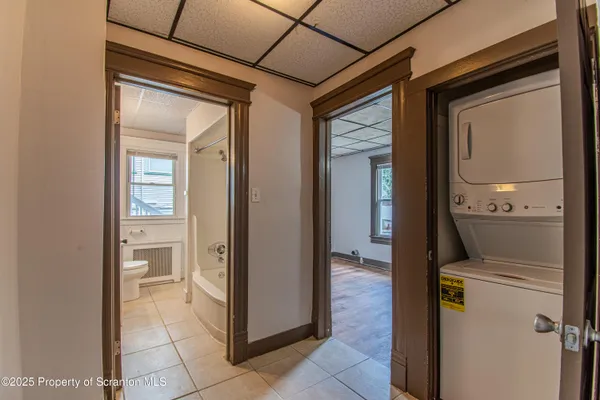 a view of hallway with washer and dryer
