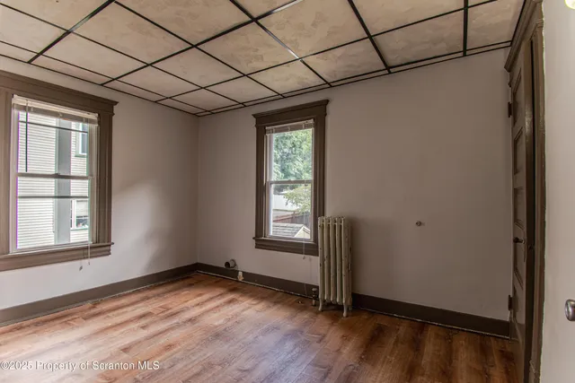 an empty room with windows