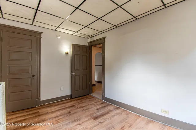 a view of a room with a hallway