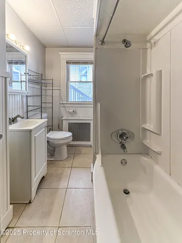 a view of entryway with a front door