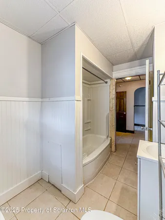 a view of a big room with a chandeliers