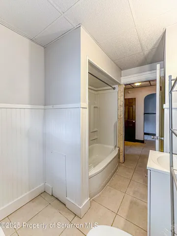 a view of a big room with a chandeliers