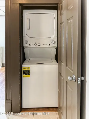 a view of a balcony and yard