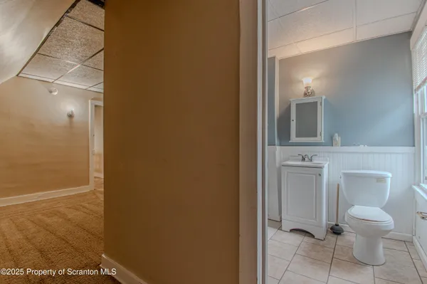 a bathroom with a toilet