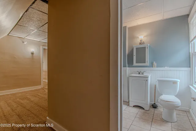 a bathroom with a toilet