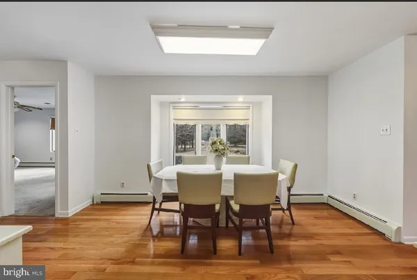 a bathroom with a tub and shower