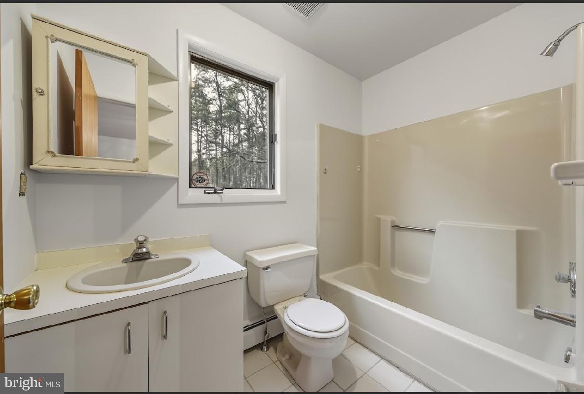 1159 Moss Mill Road Hammonton, NJ 08037 - Photo 20 of 31 a bathroom with a sink a toilet and shower