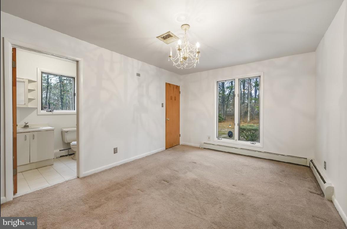 1159 Moss Mill Road Hammonton, NJ 08037 - Photo 23 of 31 wooden floor in an empty room with a window