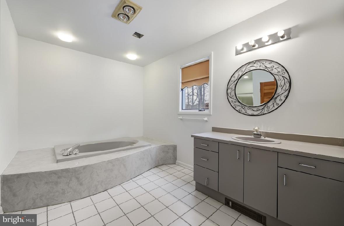 1159 Moss Mill Road Hammonton, NJ 08037 - Photo 28 of 31 a bathroom with a sink and a mirror