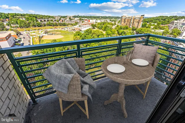 a view of a chairs and table on the terrace