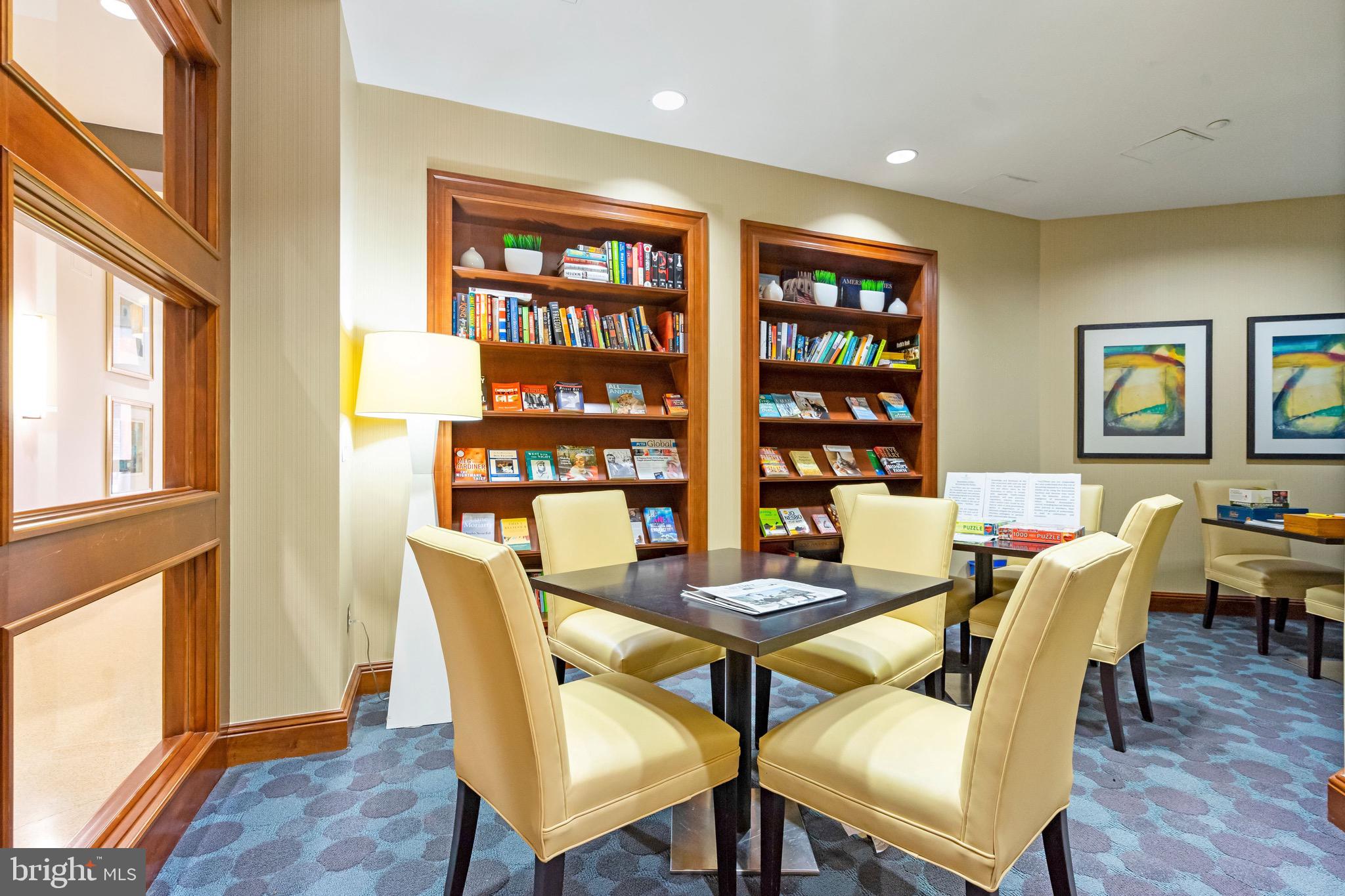 2720 South Arlington Mill Drive, Unit 1102 Arlington, VA 22206 - Photo 26 of 28 a dining room with furniture and wooden floor
