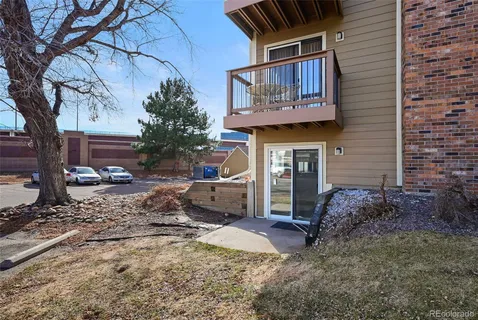 a view of a house with a yard and garage
