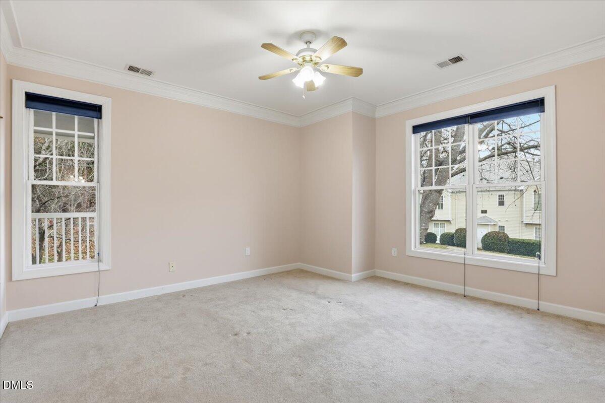 1301 Durlain Drive, Unit 208 Raleigh, NC 27614 - Photo 18 of 28 a view of an empty room with a window
