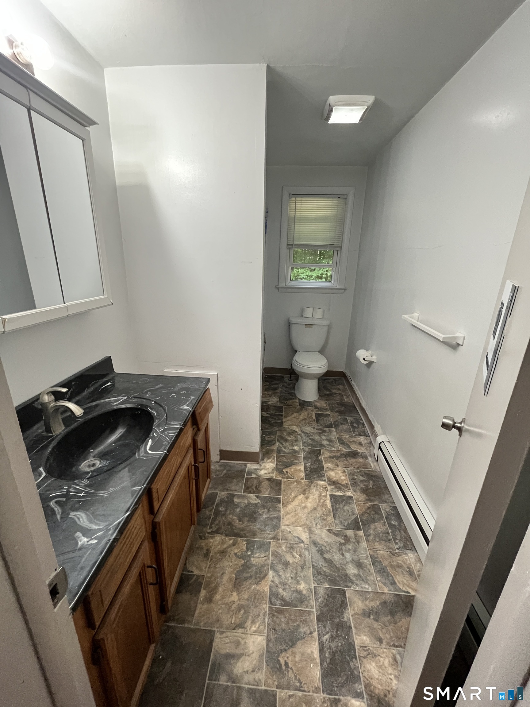 332 Richmond Road Coventry, CT 06238 - Photo 15 of 15 a kitchen with a stove and a sink