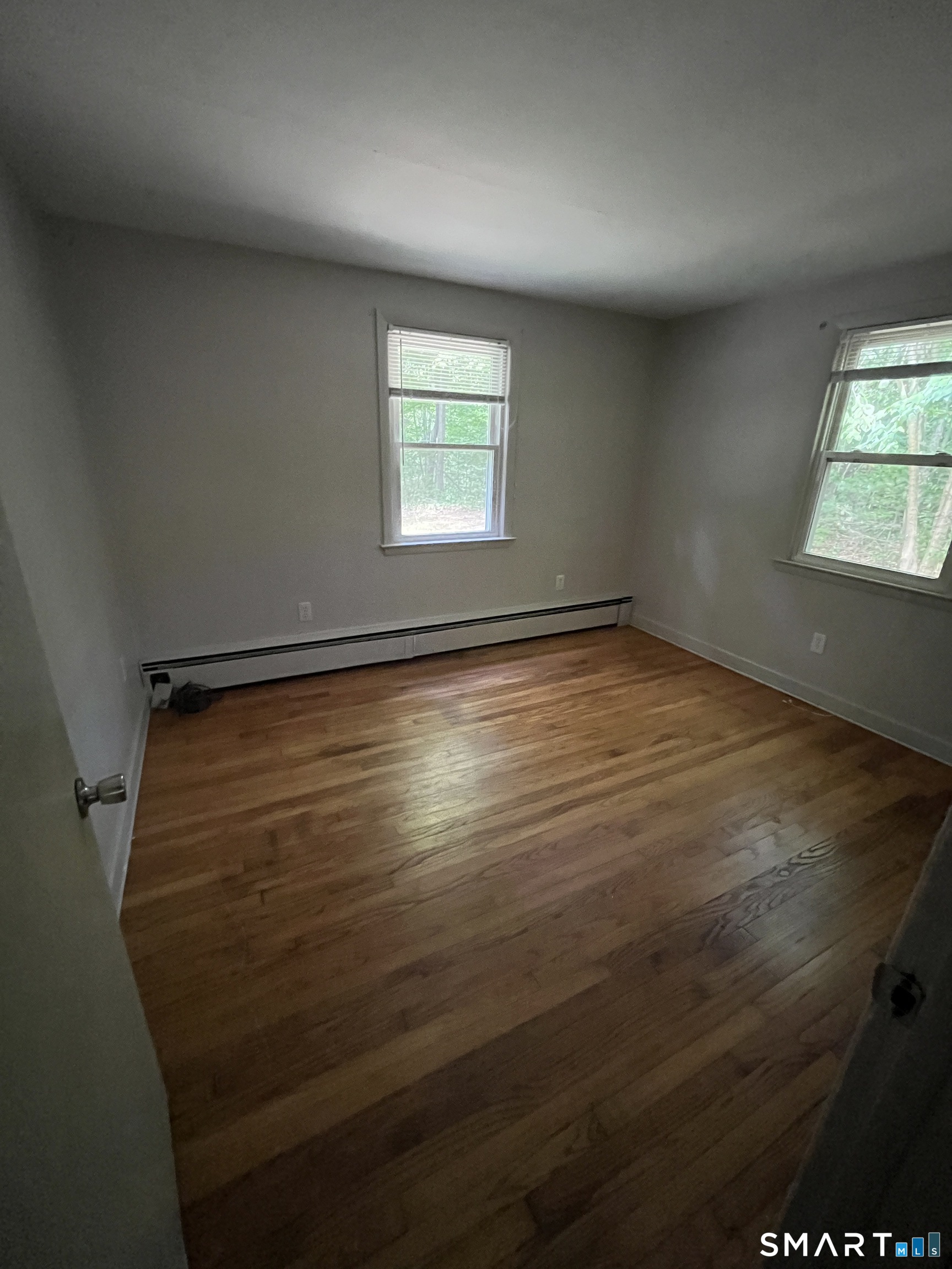 332 Richmond Road Coventry, CT 06238 - Photo 5 of 15 an empty room with windows