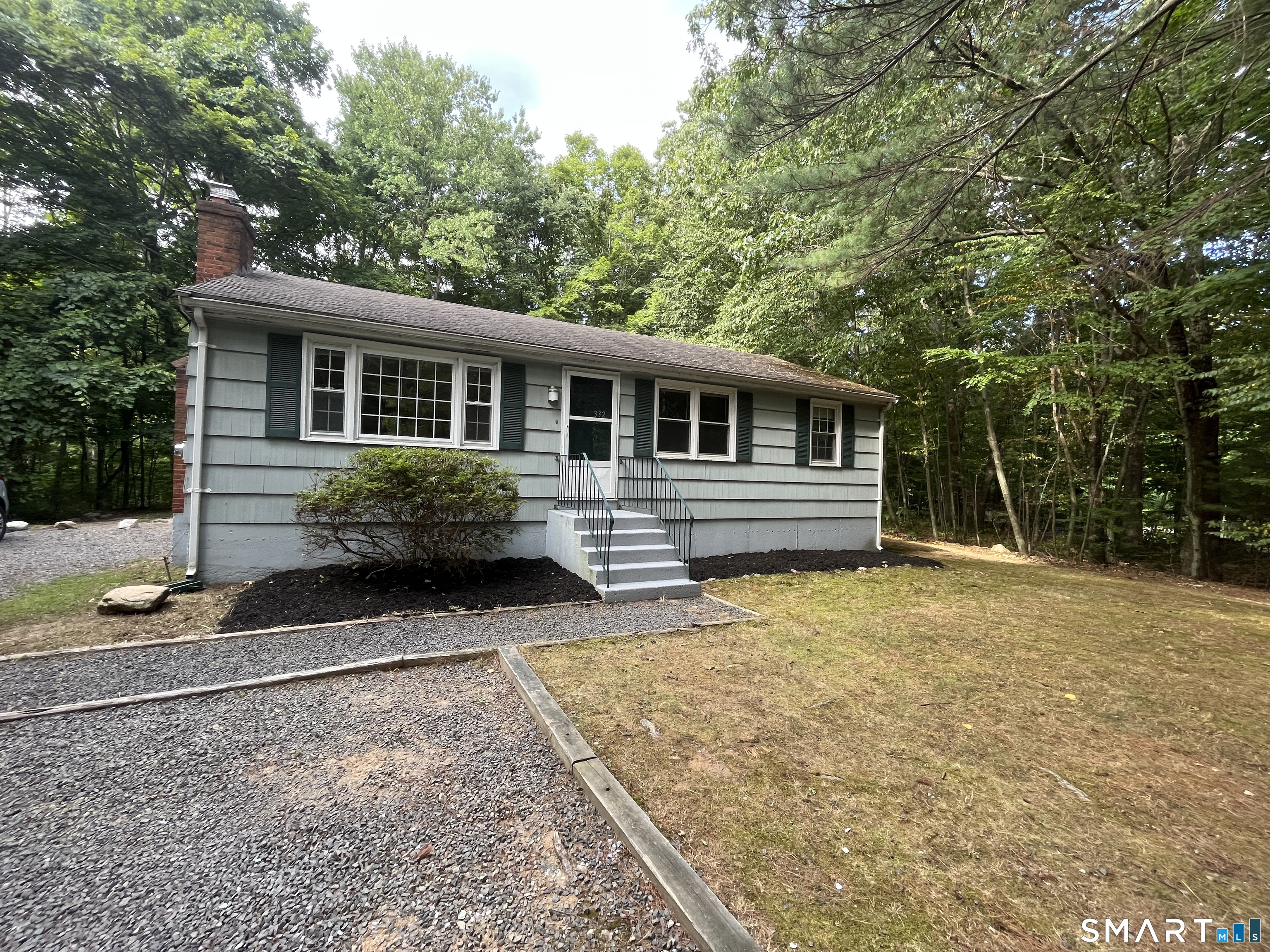 332 Richmond Road Coventry, CT 06238 - Photo 9 of 15 a backyard of a house with yard and barbeque oven