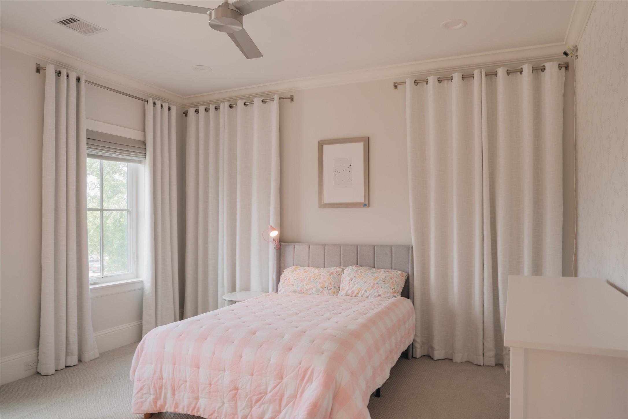 3817 Aberdeen Way Houston, TX 77025 - Photo 28 of 45 Back upstairs, a bedroom with four windows and views of the front yard.