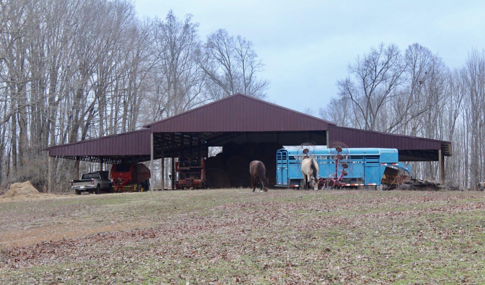 462 Appleton Road Five Points, TN 38457 - Photo 3 of 6 Large metal barn great for hay or large farm equipment. Owners worked cows on the farm and had 2 horses.